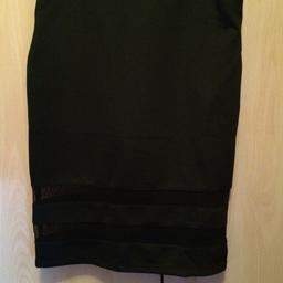 Ladies 'H&M' Black Knee High Skirt Size Small. (I would say Size Uk 10-12)

Excellent condition. Still with tags on -never worn.

If you he any questions or would like more pictures please ask.