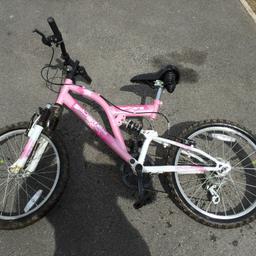 Girls sulverfox bike in pink with two spare wheels and tyres good working order slight tear to seat frame size 14"