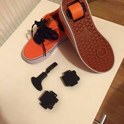 Bright orange heelys with one wheel that can be taken out and just be used as trainers, brand new no box, come with took to take wheel out. £20