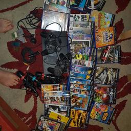 Back up for sale as no show for collection Ps2 with 30 games eye toy x3 microphones 4 memory cards would like £55