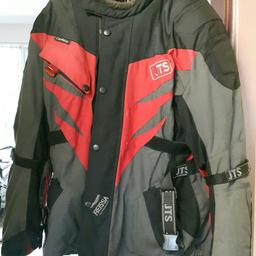 JTS motorcycle jacket. size XL. fully lined with removable winter liner. all pockets /zips and fasteners are good. jacket is in excellent condition.
full elbow and back armour included .
 collection welcome or can post for a fee of £6.00