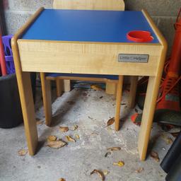 Blue wooden table and chair. Crack in the red cup but can be removed and chipped underneath which you can't see at all