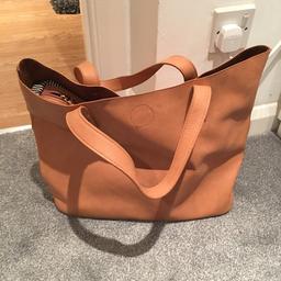 Leather warehouse bag, great condition. Has a stripe separate bag inside