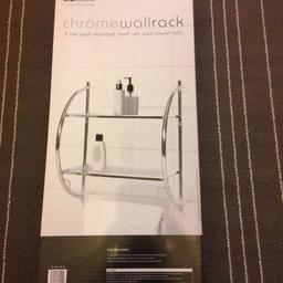 Brand new bathroom wall rack. Never been used, still boxed up, never been taken out of the box.