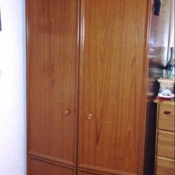 Large double doored oak wardrobe, with top section and extra space on the bottom.