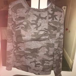 Small Camouflage tracksuit very good condition hardly been worn.