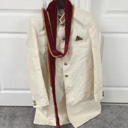 Simple, elegant men's Sherwani for sale. 

3 piece outfit! Maroon scarf with antique gold trousers and cream jacket. Worn only once!! 

To fit chest size 40/42 can be altered.

Bargain price £70!!!