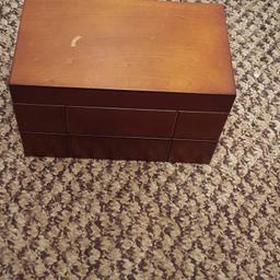 Wooden jewellery box there is a mark on the top but other wise in good condition open to offers