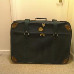Green Globetrotter suitcase, used once only. 
Height 600mm, Width 800mm, Depth 250mm.