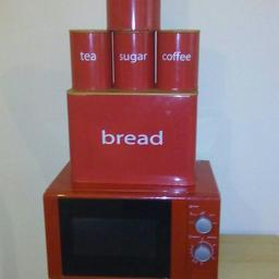 Full red kitchen set
Includes
700w microwave
Bread bin
Biscuit tin
Tea coffee and sugar canisters