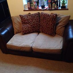Used but in good condition is my leather/fabric with 4 scatter cushions.
It's in good condition with no rips or fades.