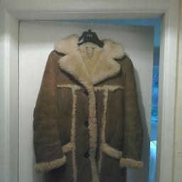 Ladies size 10 Bailey's Glastonbury genuine, knee-length, sheepskin Coat.