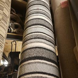 Felt backed twist pile grey silver and black stripes. Heavy domestic.  Comes with a roll of 8mm pu underlay. Worth over 230.00.