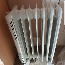 Handy mobile radiator. Low running costs . Temperature gage setting.