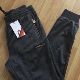 Ellesse charcoal poly joggers.. Unworn still with tags.. Men's size small..