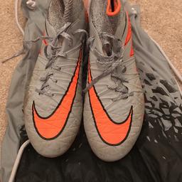 Grey/Orange Nike HyperVenom Rugby Boots. Without box. Comes with stud spanner and boot bag. Worn once. Size UK 7.