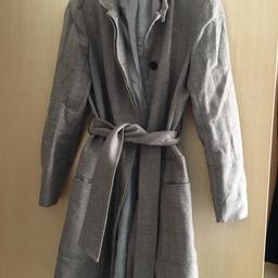 Beige medium length coat. Size 10-12