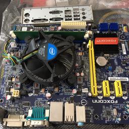 Foxconn N15235 mother board with intel i3 2130 3.4g cpu and heat shield and I/o plate will leave ram installed which is just 1gb DDR3 
Perfect working order £50