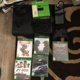 Xbox one used only 2-3 times about 12 months old, unfortunately no box. Reason for selling is preference to PS4. Comes with all power cables including the Xbox HDMI cable as well as play and charge kit. Come with 5 games which are: Gears of War Ultimate Edition, Halo 5 Guardians, F1 2015, Forza Motorsport 6 and Rare Replay.