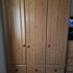 Hanging space for clothes but no shelves, and 5 drawers at bottom. (3 small and 2 large drawers). Good condition, the middle door doesnt shut properley ( slightly adjar) and a tiny chip in the front of it. Comes in 3 parts.. £50 or make me an offer but not silly offers