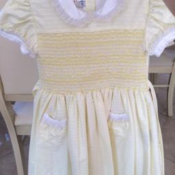 Beautiful girls Spanish dresses and smock dresses like new hardly ever worn from ages 4 to 6 £50 for the lot.