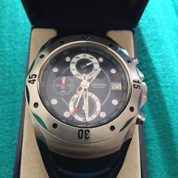 The watch is in mint condition and comes with its box..