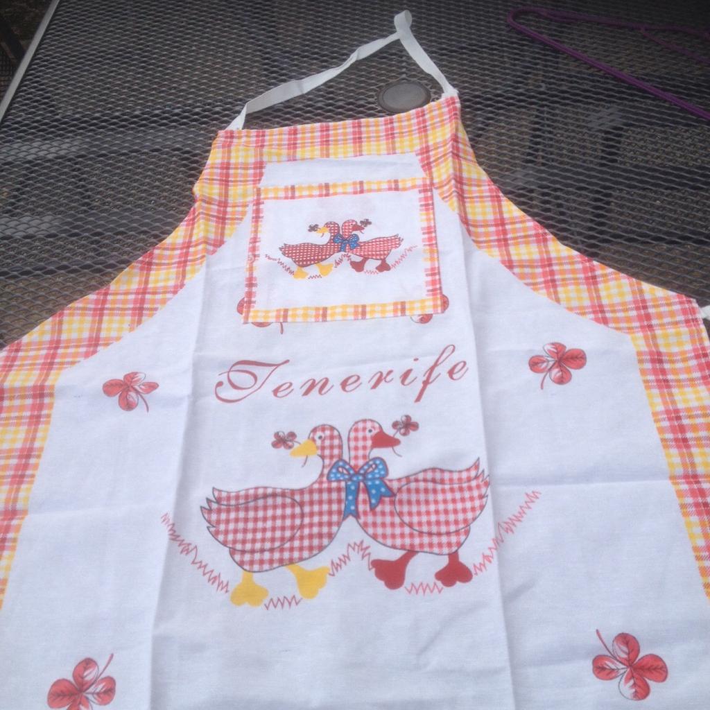 This is a lovely cute Apron for children or adults.Ideal for cooking or painting.Brand new never was used.