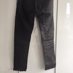 All Saints low rise leather trouser with the famous "Saint" logo on the bum. 
Dark brown, raw edge details, zip at cf, pockets and ankles.
Size S/10 hardly worn