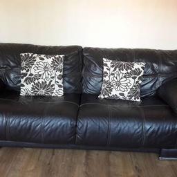 A large 3 seater leather couch and chair, great condition still selling for over £1700 only selling as getting a material sofa