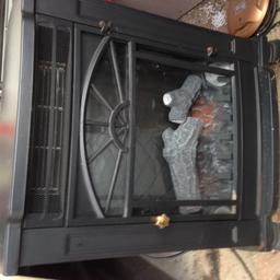 Woodburner style electric fire - no remote - all dials on the back of the fire - surplus to requirement - Checked today and there are slight patches of surface rust and cosmetic scratches which could be sanded off and repainted - so reducing price to £10 no offers