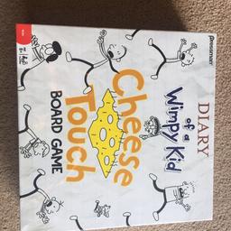 Brand new never been opened pristine condition Diary of a Wimpy Kid Cheese Touch board game.