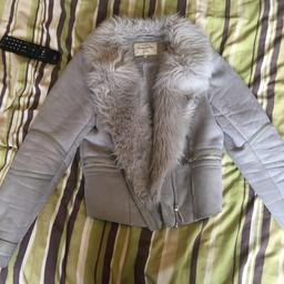 Grey river island jacket in good condition just a small hole at back but can easily be sown back up as it's on the seam costed £80