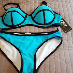 Brand new with tags & hygiene sticker to bottoms.
Size small
Electric blue with black 
Moulded cups & removable straps