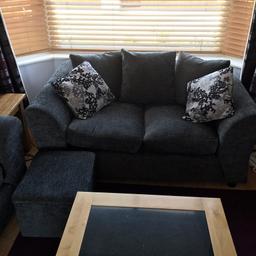 Charcoal sofas bought less than a year , hardly used paid £578.98 and £35 for footstool , very clean sofas ready to go .Im selling for £250