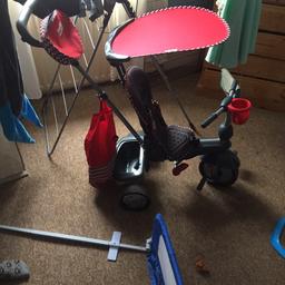 Toddler trike hardly used. Still in good condition. Is missing the flap that goes over rear storage box. Has a 3 point harness. Handle comes off for when child is older.