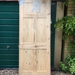 Interior knotty pine door size 80 inches x 32.