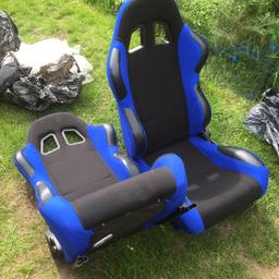 Brand new pair of blue and black reclining bucket seats - can be fitted to any car as runners along bottom of seats.

Open to offers - pick up only.
