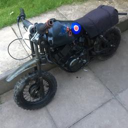 It's used but runs it has about a 50cc engine runs but needs a clutch it has a kick start also needs some foot pegs but apart from that its a good bike for having fun with.