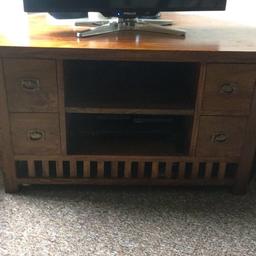 Wooden tv unit with drawers either side. Good condition