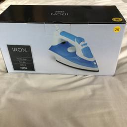 Steam iron brand new never been out of the box, Variable steam settings 2200w anti drip anti calc self cleaning, light weight 1kg, steam shot function and water spray function, blue and white design smoke and pet free home
