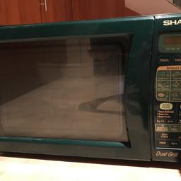 Sharp 800W category E GREEN microwave oven with grill used but still in perfect working order. Doesn't go with our kitchen colour scheme now!! Collection or local delivery if prepared to pay fuel costs.