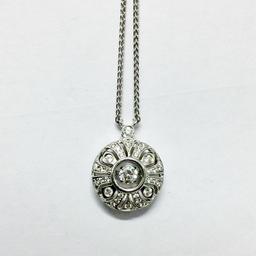 Introducing this unique 925 Sterling Silver necklace set with sparkling Cubic Zirconia's. The centre stone hangs freely and is surrounded by further stones on a stylish design. The total carat weight of CZ stones are 0.33pts. The chain length is 16" and combined weight with pendant is 3.4 grams. Will make the perfect gift.