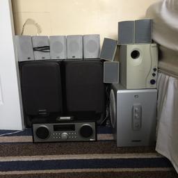 Here I am selling a good sound quality speakers two surround sound sound systems one with 4 speakers and subwoofer and one with 5 speakers and subwoofer also included extra two big daulway aiwa speakers one damaged on bottom dosing effect performance and there is a iPhone 4 docking station radio. £60 or nearest Offer if any questions pleas ask