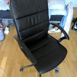 Black leather office chair in good condition.