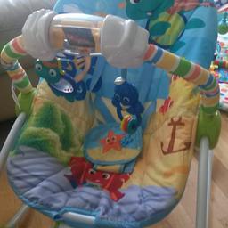 Plays music & vibrates. Can put in standing position so it doesn't rock as shown in one of the photos. Great condition only used handful of times as baby had 2! Couple scratches as shown in the photo.