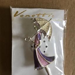 Lady with umbrella brooch
Very desirable 
No Marks
Still sealed wrapping 

Becoming rarer to find these days

Will post for £1.25

PayPal and Bank Transfer Accepted