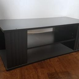 Wide floor unit with shelves for dvd player or tv box and storage at each end. Grey/blk mottled top. 39" w x 17" d x 14" h