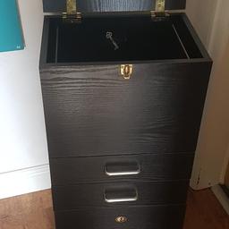 Cabinet with A4 hanging filing, 2 drawers and lockable section at bottom. 30"h x 16"w x 11.5"d