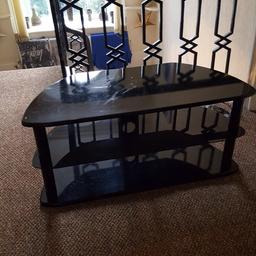 Heavy 3 tier tv stand, glass shelves. Some marks on top as shown in pics. Otherwise good condition.