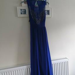 Beautiful dress with front detail, never worn still with tags, size 12 ideal for prom, or party. I paid £80 for it but will let it go for half of that.